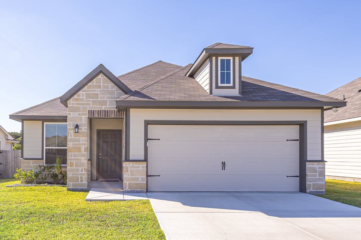 A well-maintained American home in a quiet suburban neighborhood