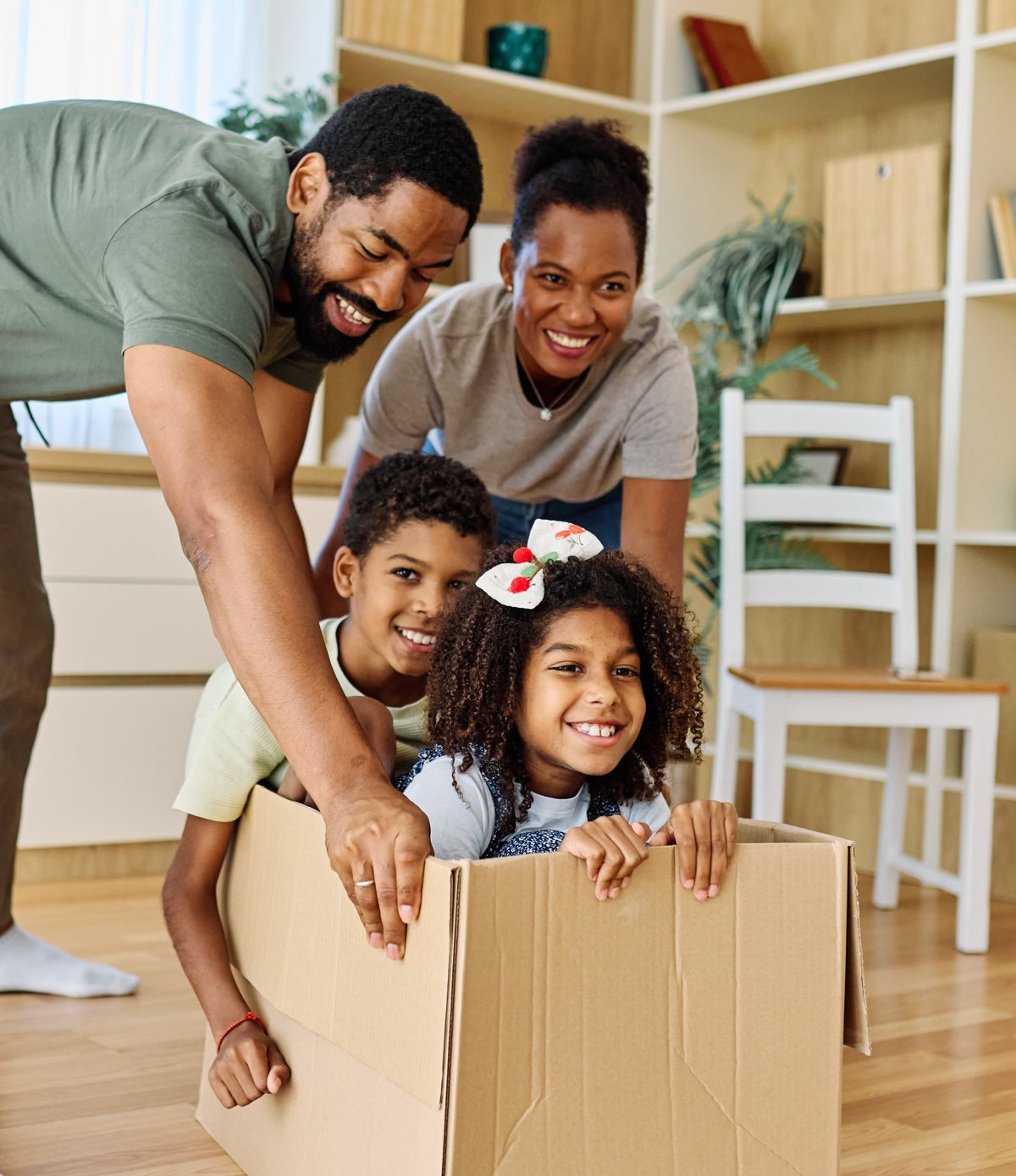 A happy family enjoying a moment together after successfully selling their home